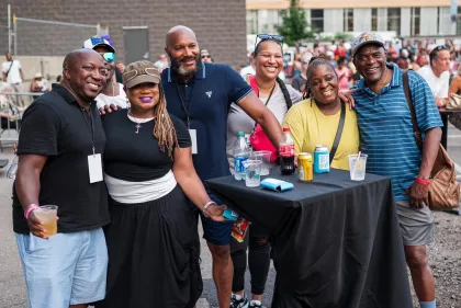 A group of happy concertgoers at the Taste of Minnesota festival
