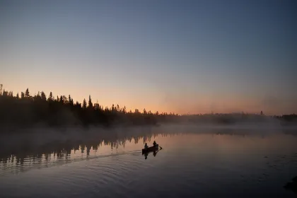A couple canoes through the Boundary Waters