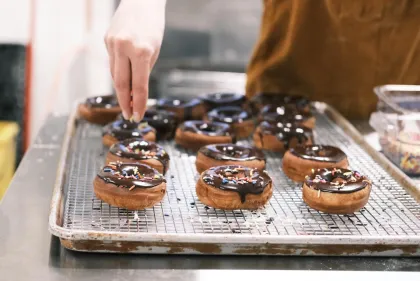 Freshly sprinkled donuts at Bread People