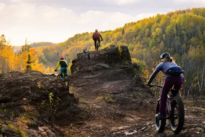 Mountain bikers on Redhead Mountain during fall