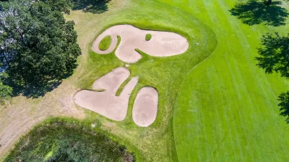 The Snoopy-shaped 15th hole at Highland Golf Course
