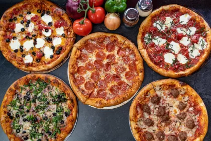 Five of the pies at Tommie's Pizza