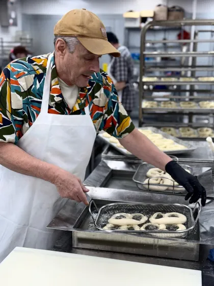 Joachim Berndt prepares fresh pretzels at Aki's Breadhaus