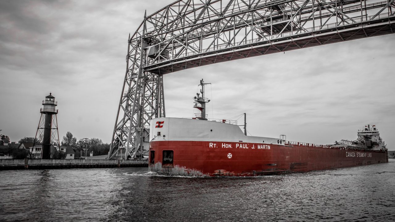 Ship passes beneath the Aerial Lift Bridge in Duluth