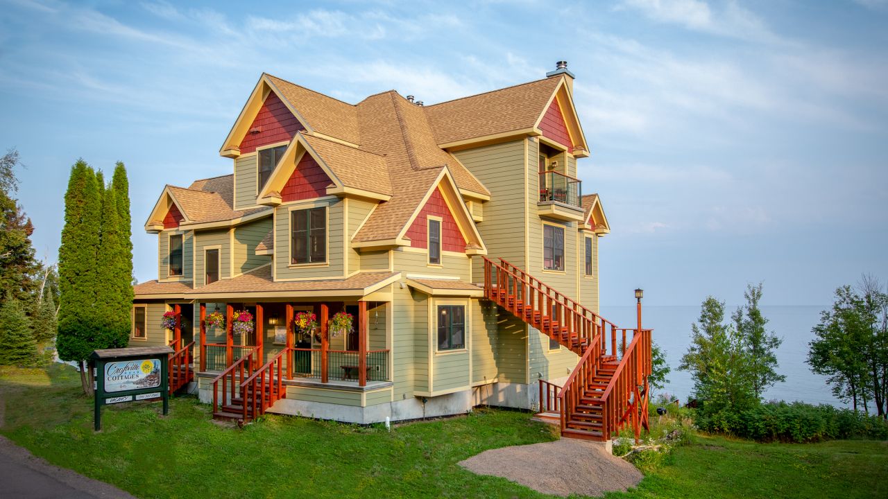 The stunning, green and red Croftville Road Cottages inn on Lake Superior