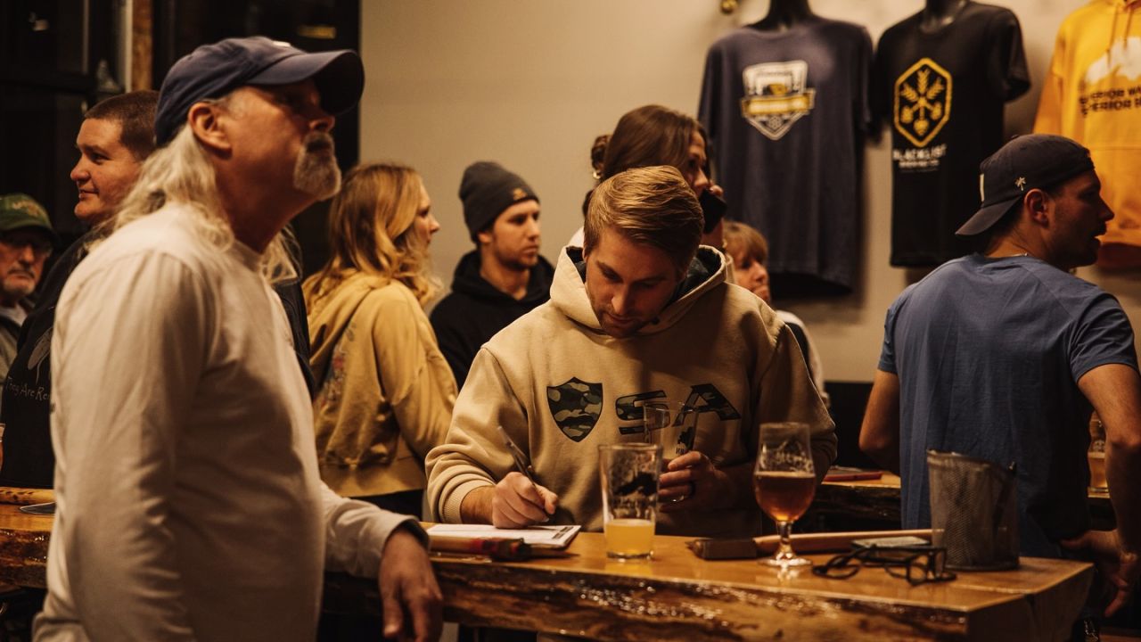 An axe-throwing match at Blacklist Brewing Co.