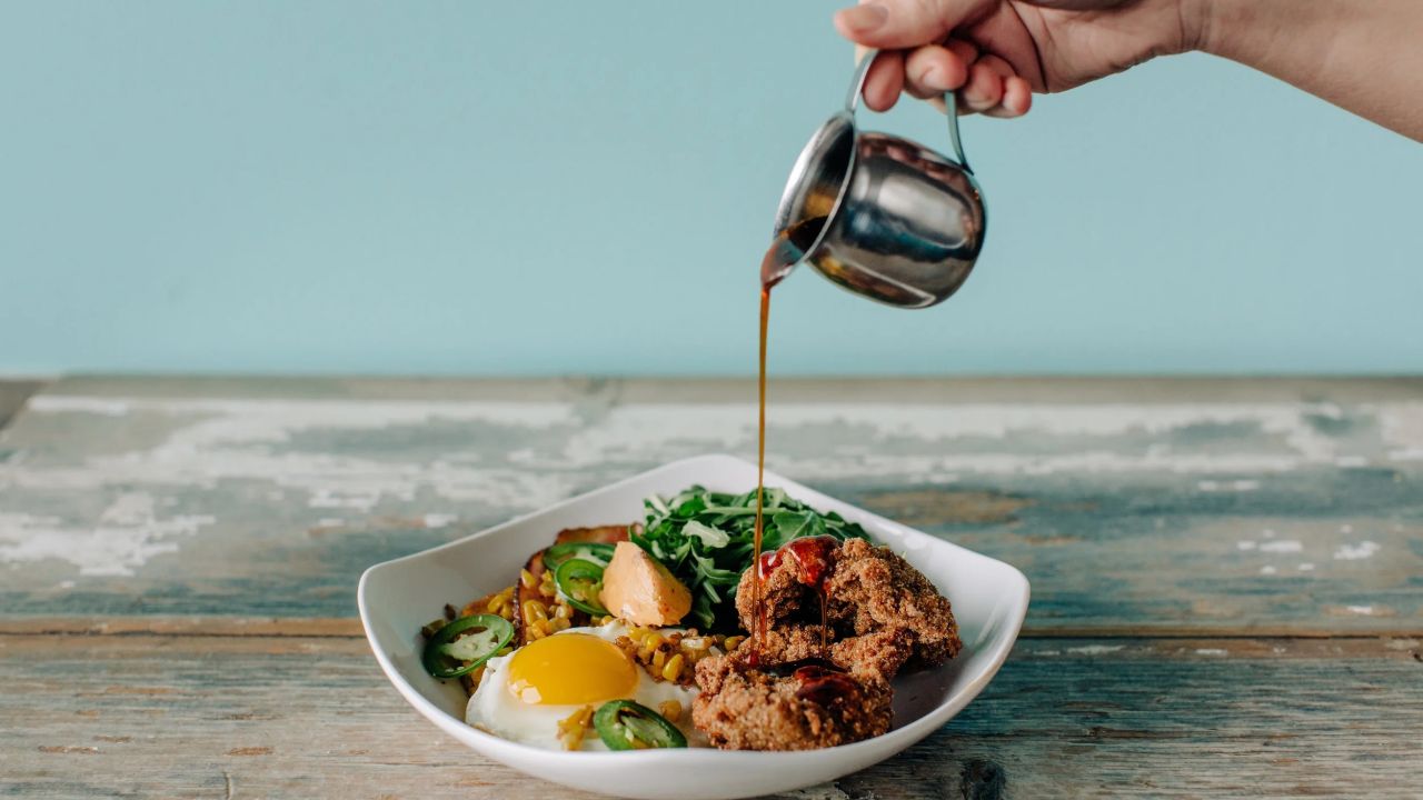 Fried chicken &amp; cachapa on Hola Arepa's brunch menu