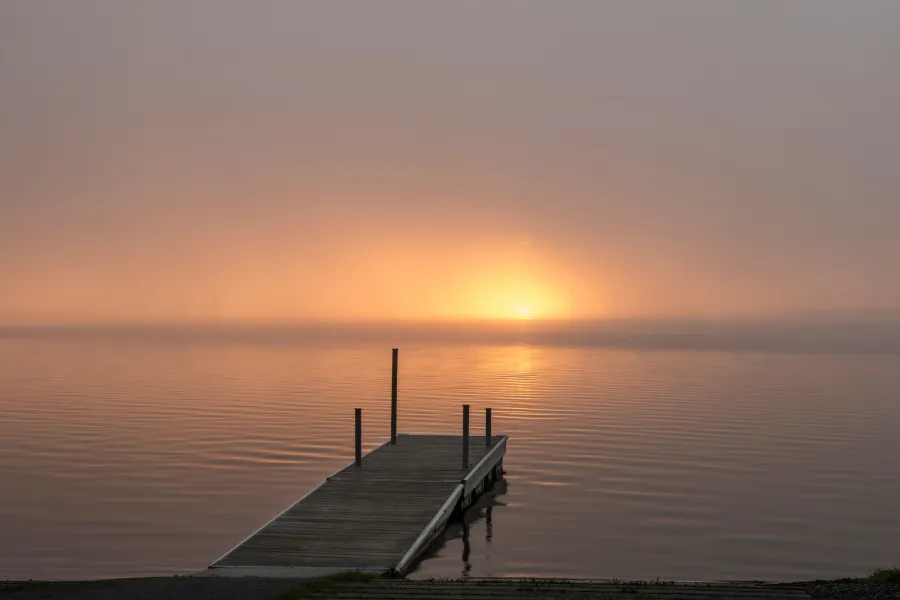 Misty morning sunrise over Leech Lake, Walker
