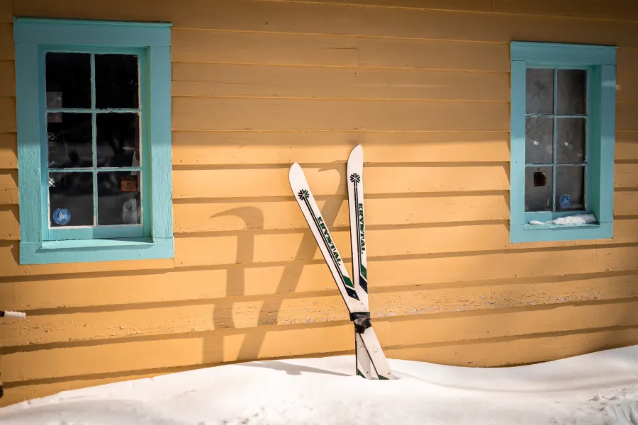 A pair of skis propped up against Doc's Harbor Inn in Warroad