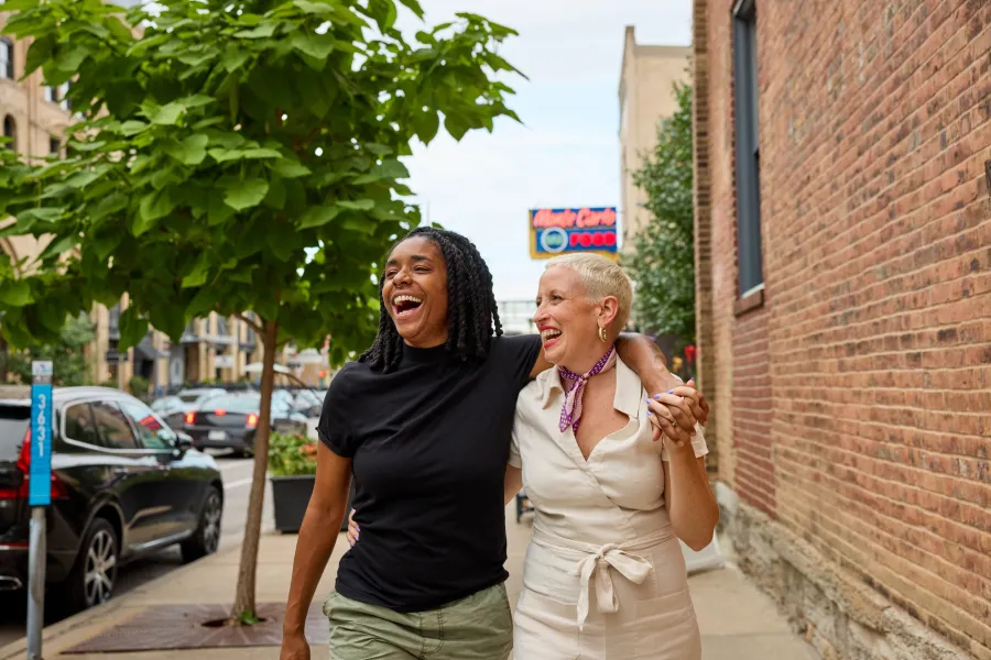 A couple walks around Minneapolis' North Loop neighborhood 