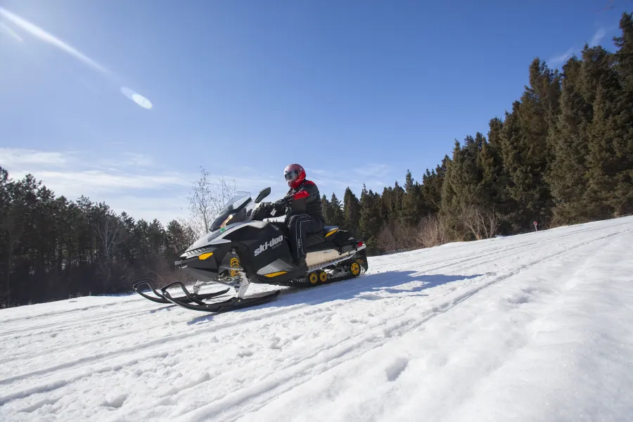 A snowmobiler in Lake Mille Lacs