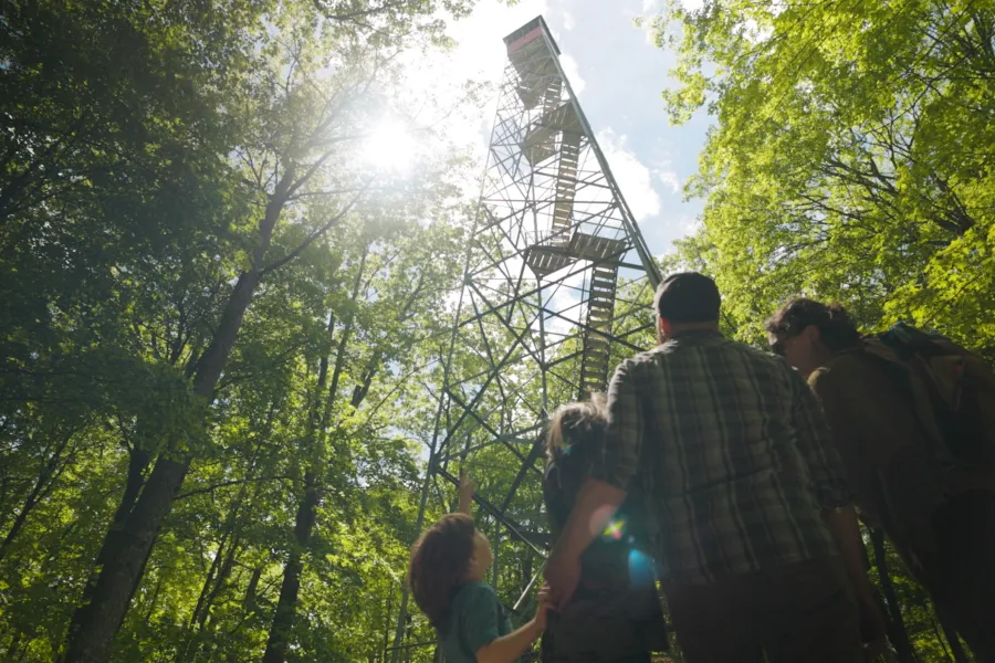 A family hiking at Mille Lacs Kathio State Park