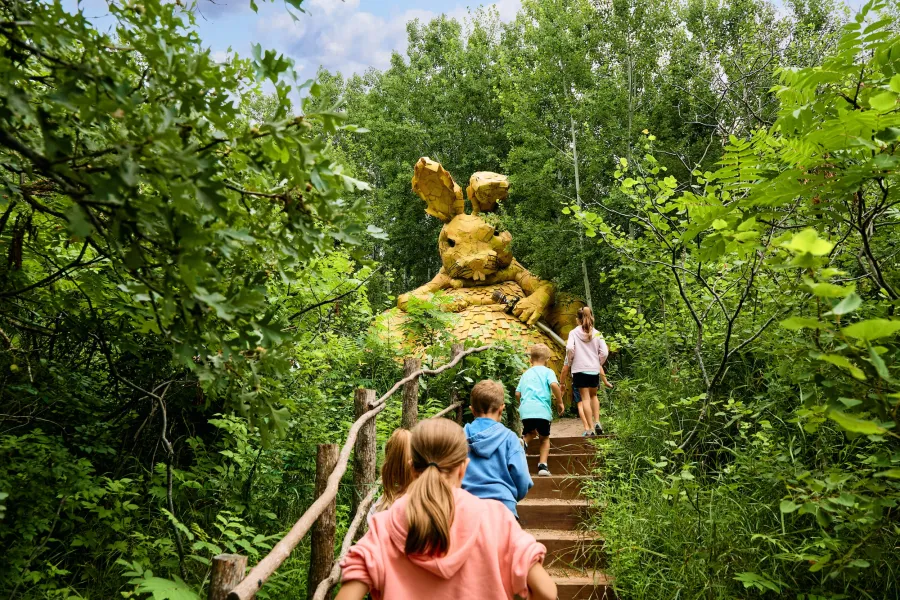 A family finds Thomas Dambo's Golden Rabbit sculpture  