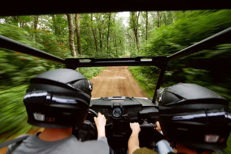 A couple riders on the Fort Ripley ATV trail 