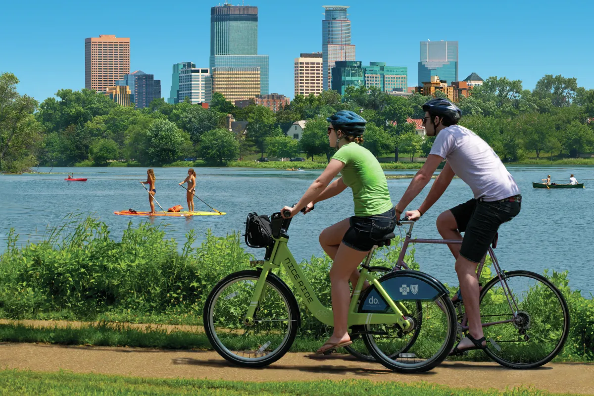 Biking around Bde Maka Ska, Minneapolis skyline in background