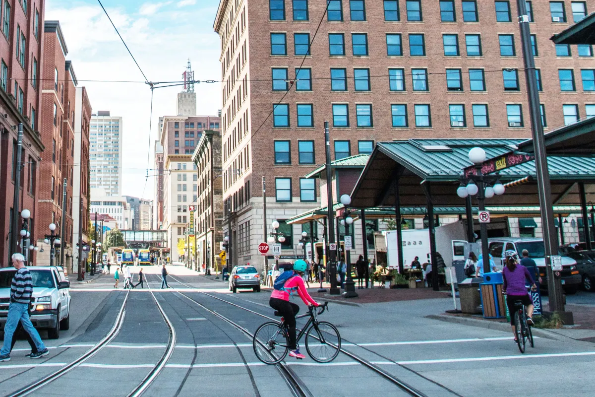 Woman biking in Lowertown St. Paul