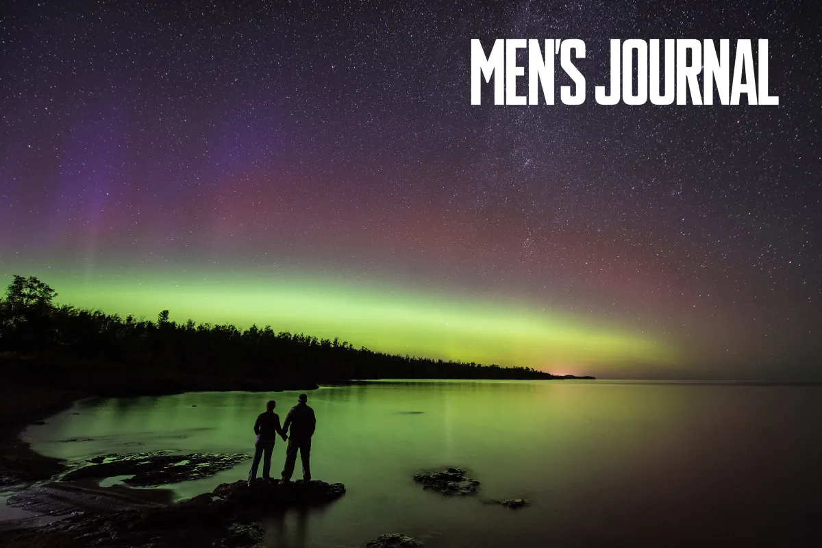 For media room a couple watches the northern lights at gooseberry falls