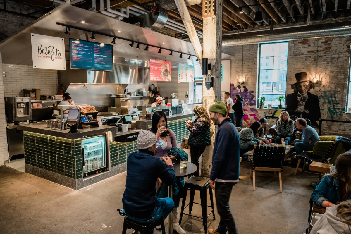 Customers eat at Malcolm Yards' food hall