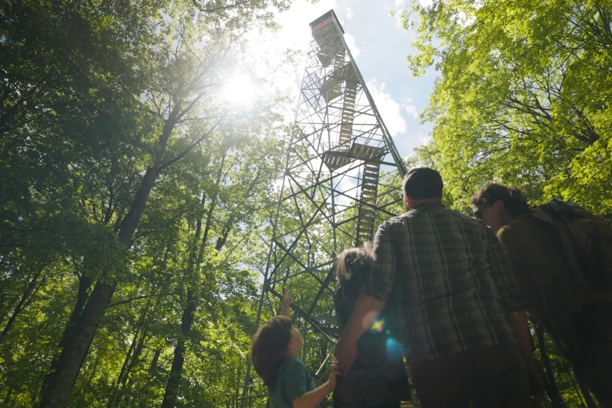 A family hiking at Mille Lacs Kathio State Park