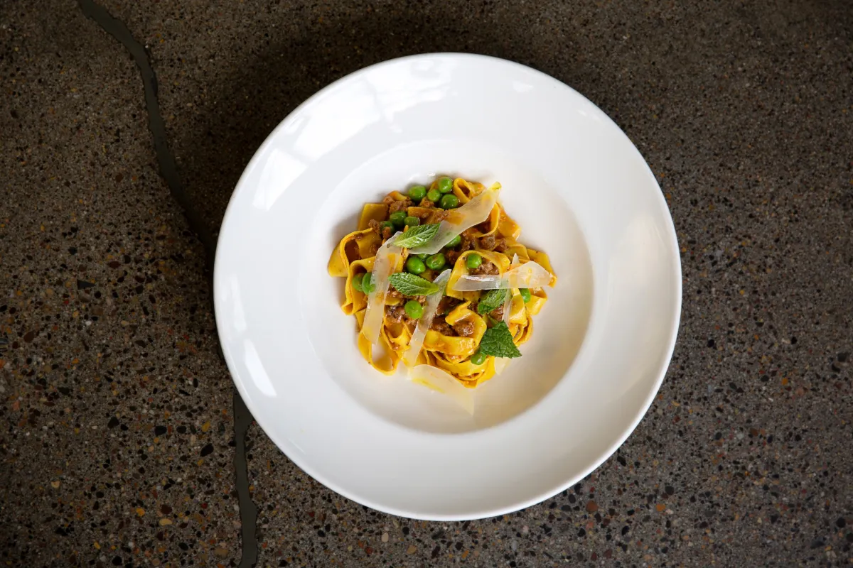 Alma's tagliatelle with lamb ragu, peas, mint and pecorino