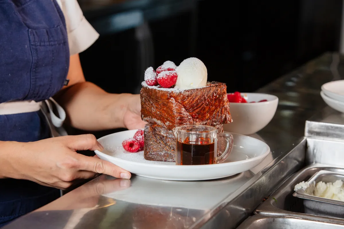 Chef Diane Moua with her Thai Tea French Toast from Diane's Place