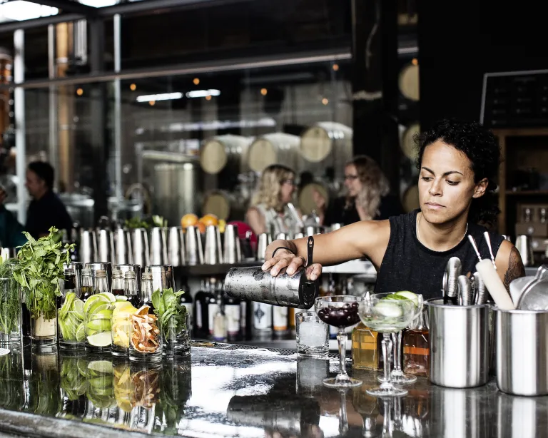 Bartender at Tattersall Distilling in Minneapolis / Photo by The Restaurant Project