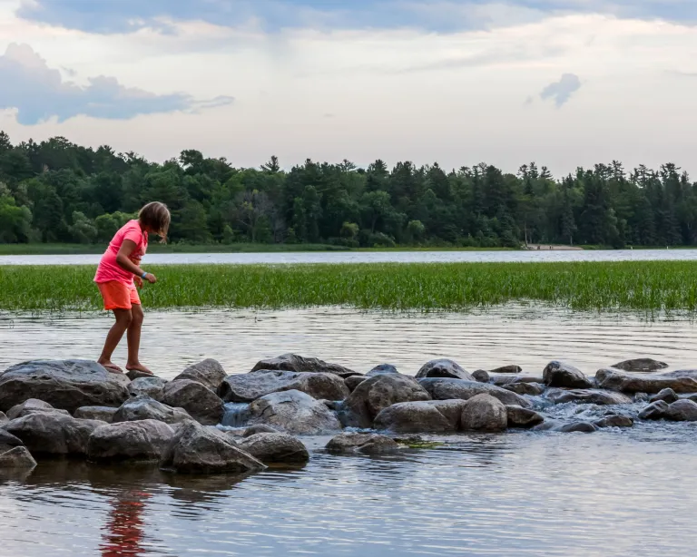 kids crossing the mississippi headwaters itasca state park