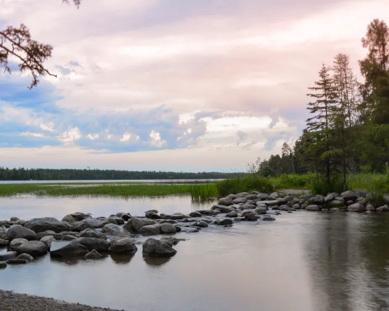 The Mississippi River headwaters under a pastel sky at Itasca State Park