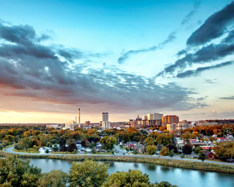 Skyline at sunrise over Silver Lake Rochester