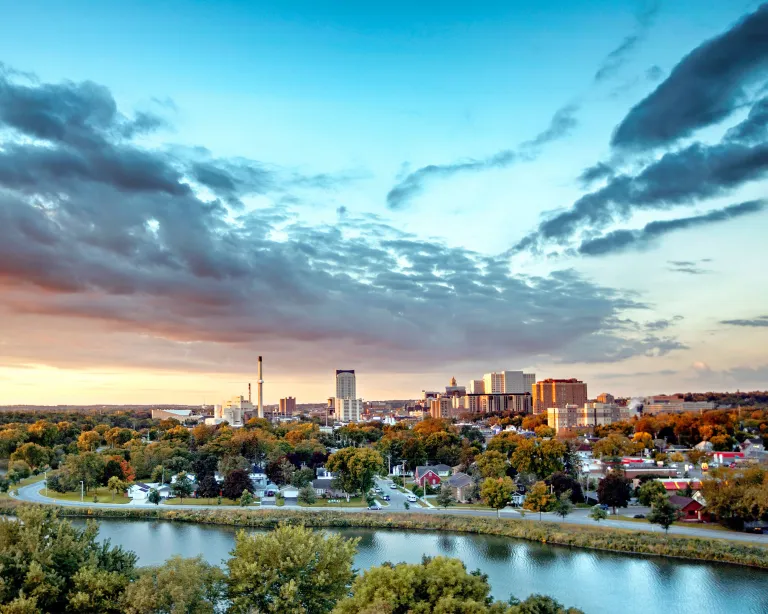 Skyline at sunrise over Silver Lake Rochester