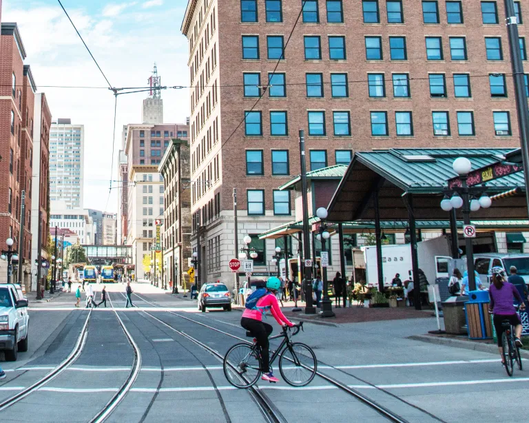 Woman biking in Lowertown St. Paul
