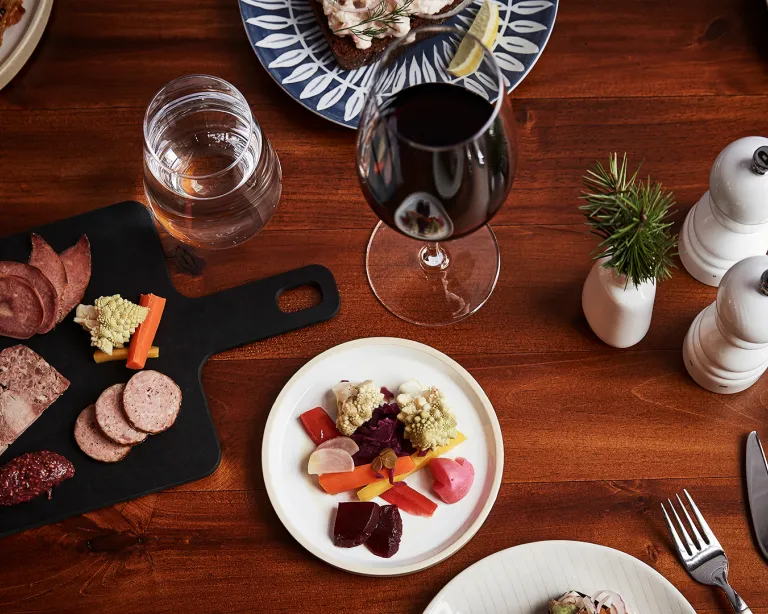 Delicious small plates and locally bottled wine at Happy Hour at Tullibee