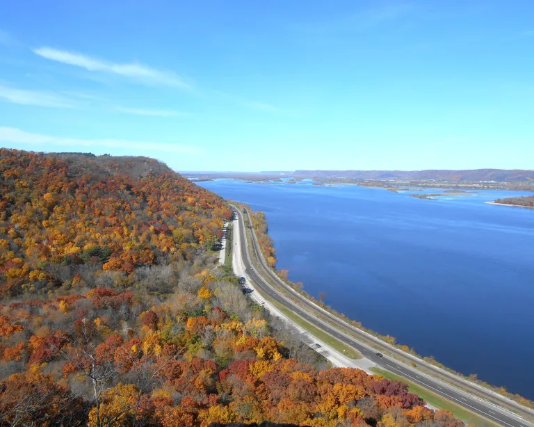A view from high above Great River Road in Fall, with the lake to the right
