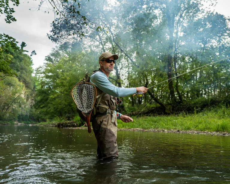 A man fly fishing in Root River, Spring Valley
